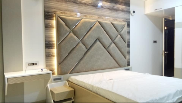 Quilted bed with high back panel